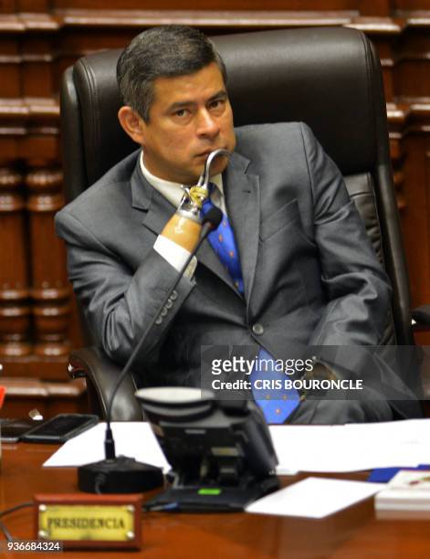 The president of the Peruvian Congress Luis Galarreta, presides the session to discuss whether to accept President Pedro Pablo Kuczynski's...