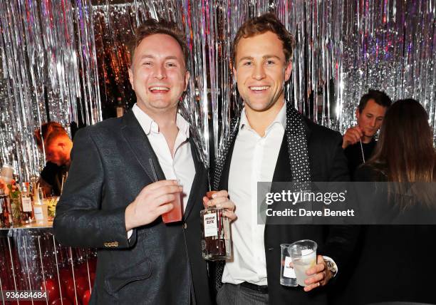 Hamish Millar and Leander Cadbury, drinking Absolut Elyx cocktails, attends the Self-Portrait store opening after-party at Central St Martins on...