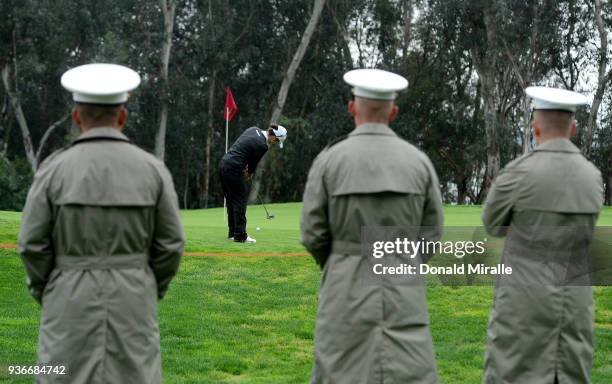 Members of the Marines watch Beatriz Recari of Spain off the 1st hole during Round One of the LPGA KIA CLASSIC at the Park Hyatt Aviara golf course...