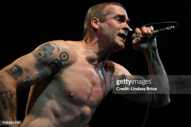 Rollins Band at Nokia Theater. Henry Rollins, eyes open with furrowed brow, sings in performance with Rollins Band on June 16, 2006 at the Nokia...