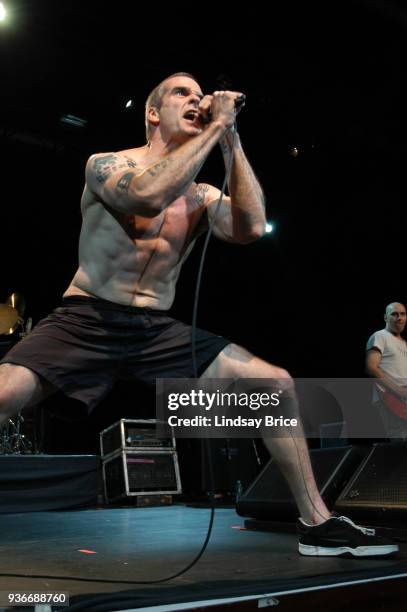 Rollins Band at Nokia Theater. Henry Rollins in wide stance as he sings in performance with Rollins Band on June 16, 2006 at the Nokia Theater in New...