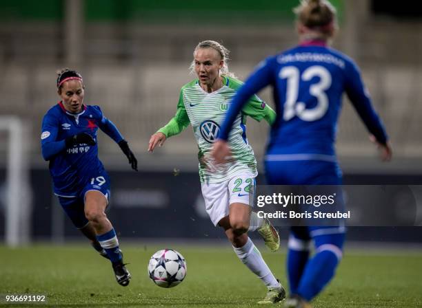 Pernille Harder of VfL Wolfsburg is challenged by Petra Divisova of Slavia Praha and Jitka Chlastakova of Slavia Praha during the UEFA Women's...