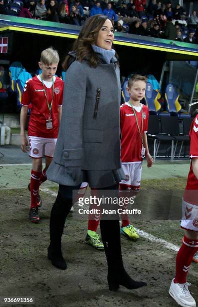 Crown Princess Mary of Denmark receives from Danish Football Association DBU President Jesper Moller a check of 50 000 euros from 'UEFA Foundation...