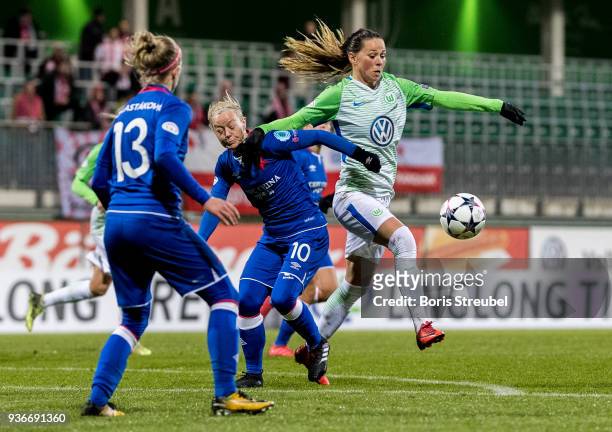 Caroline Graham Hansen of VfL Wolfsburg is challenged by Blanka Penickova of Slavia Praha and Jitka Chlastakova of Slavia Praha during the UEFA...