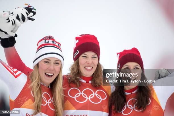 Gold medal winner Michelle Gisin from Switzerland with silver medalist Mikaela Shiffrin of the United States and bronze medalist Wendy Holdener from...