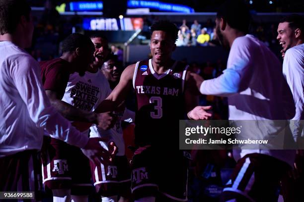 Admon Gilder of the Texas A&M Aggies takes the court against the Michigan Wolverines during the third round of the 2018 NCAA Photos via Getty Images...