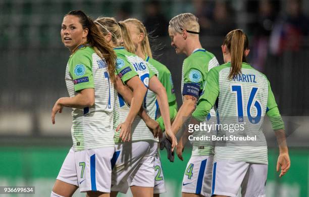 Sara Bjoerk Gunnarsdottir of VfL Wolfsburg celebrates with team mates after scoring her team's fourth goal during the UEFA Women's Champions League...