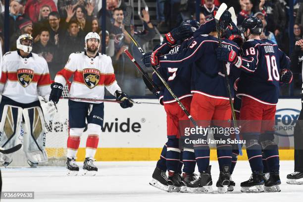 Seth Jones of the Columbus Blue Jackets celebrates his second period goal with his teammates during a game against the Florida Panthers on March 22,...