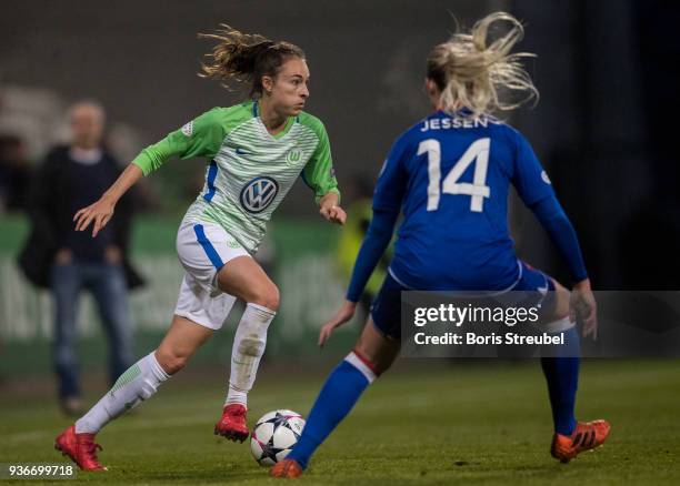 Nilla Fischer of VfL Wolfsburg is challenged by Sandra Jessen of Praha during the UEFA Women's Champions League Quarter Final first leg match between...