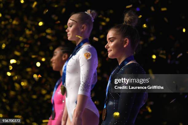 Bronze medalist, Alice Kinsella of Great Britain celebrates on the podium during day two of the 2018 Gymnastics World Cup at Arena Birmingham on...