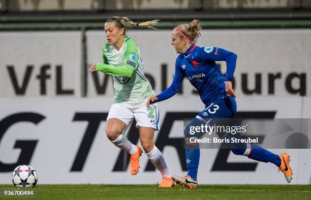 Lara Dickenmann of VfL Wolfsburg is challenged by Jitka Chlastakova of Slavia Praha during the UEFA Women's Champions League Quarter Final first leg...