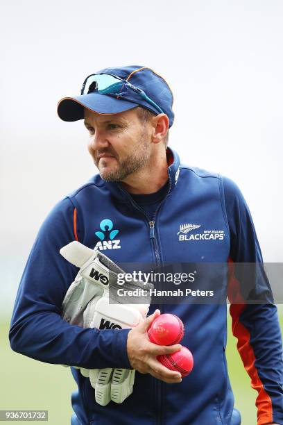 Head coach Mike Hesson carries pink balls ahead of day two of the First Test match between New Zealand and England at Eden Park on March 23, 2018 in...