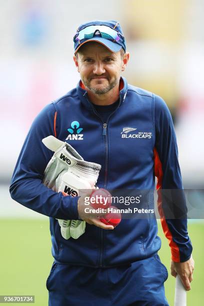 Head coach Mike Hesson carries pink balls ahead of day two of the First Test match between New Zealand and England at Eden Park on March 23, 2018 in...