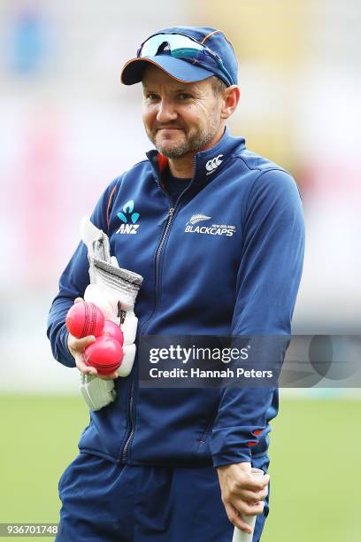 Head coach Mike Hesson carries pink balls ahead of day two of the First Test match between New Zealand and England at Eden Park on March 23, 2018 in...