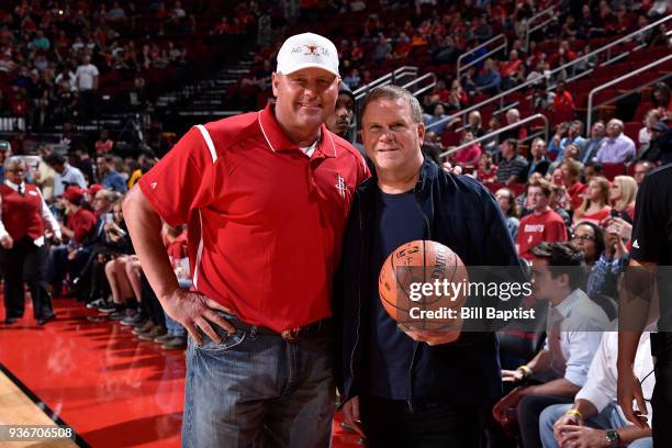 Former Houston Astro Roger Clemens and Houston Rockets owner Tilman Fertitta pose for a photo before the game between the LA Clippers and the Houston...