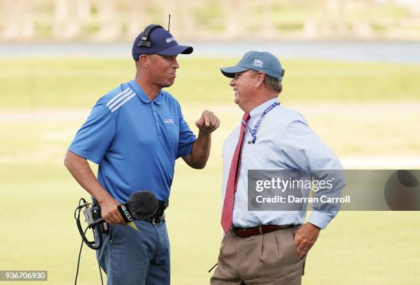 Golf channel personality Jim "Bones" Mackay talks to rules official Brad Fabel during the second round of the World Golf Championships-Dell Match...