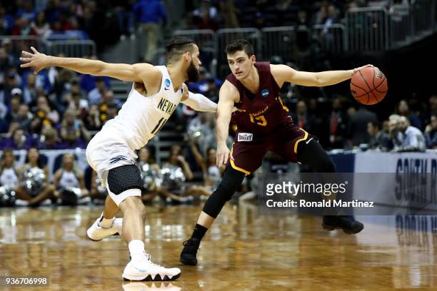 Cody Martin of the Nevada Wolf Pack defends Clayton Custer of the Loyola Ramblers in the second half during the 2018 NCAA Men's Basketball Tournament...