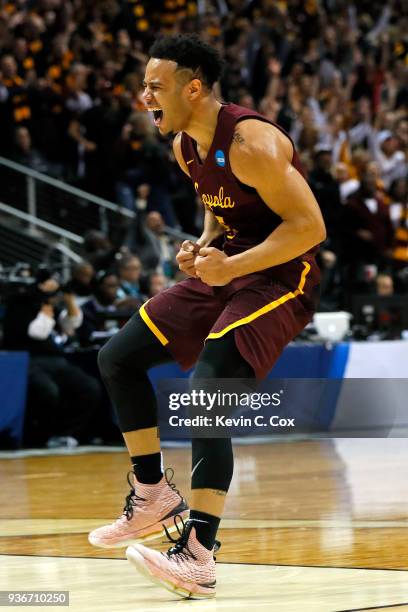 Marques Townes of the Loyola Ramblers celebrates his teams 69-68 win over the Nevada Wolf Pack during the 2018 NCAA Men's Basketball Tournament South...