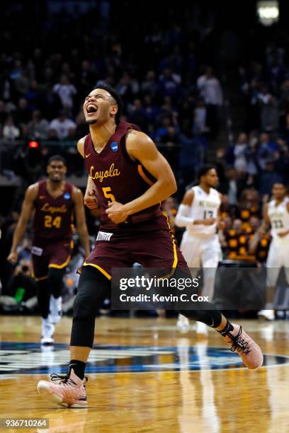 Marques Townes of the Loyola Ramblers celebrates his teams 69-68 win over the Nevada Wolf Pack during the 2018 NCAA Men's Basketball Tournament South...