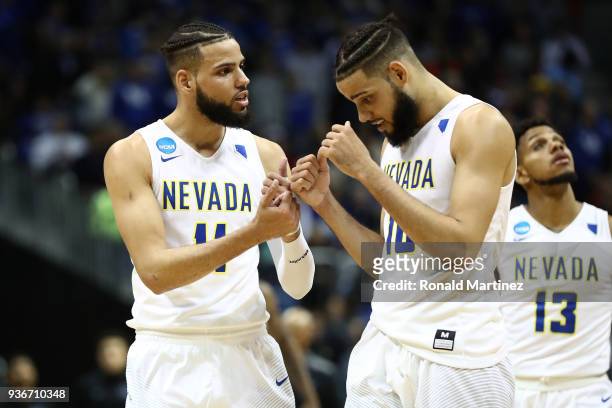 Cody Martin and Caleb Martin of the Nevada Wolf Pack react late in the second half against the Loyola Ramblers during the 2018 NCAA Men's Basketball...