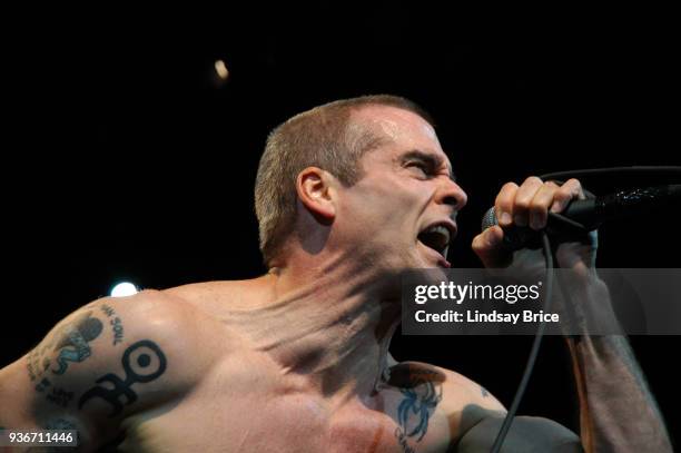 Rollins Band at Nokia Theater. Henry Rollins, sinewy neck outstretched as he roars toward audience in performance with Rollins Band on June 16, 2006...