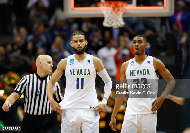 Cody Martin and Josh Hall of the Nevada Wolf Pack look on after being defeated by the Loyola Ramblers during the 2018 NCAA Men's Basketball...