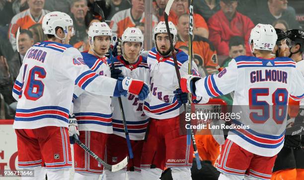 Jesper Fast of the New York Rangers celebrates his third period goal against the Philadelphia Flyers with Rob O'Gara, Chris Kreider, Mika Zibanejad,...