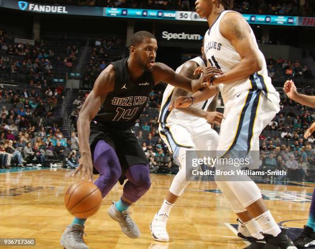 Michael Kidd-Gilchrist of the Charlotte Hornets handles the ball against the Memphis Grizzlies on March 22, 2018 at Spectrum Center in Charlotte,...