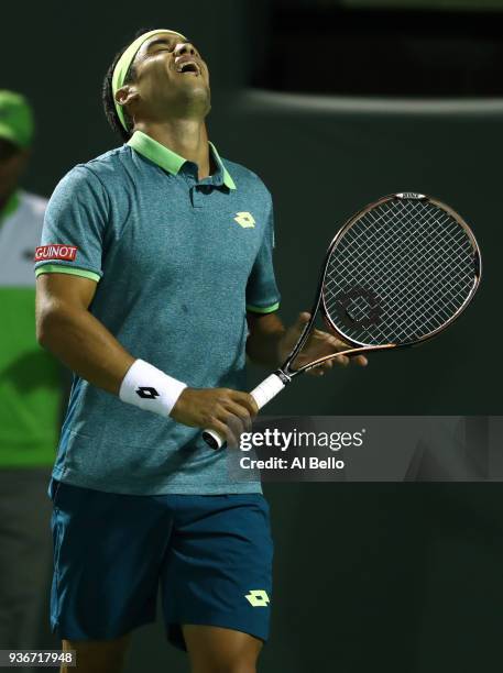 Nicolas Kicker of Argentina reacts to a lost point against Frances Tiafoe during Day 4 of the Miami Open at the Crandon Park Tennis Center on March...