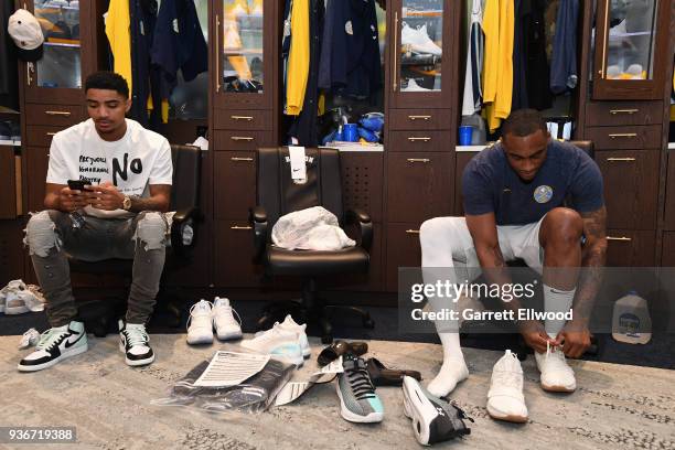 Gary Harris and Darrell Arthur of the Denver Nuggets get ready before the game against the Detroit Pistons on March 15, 2018 at the Pepsi Center in...