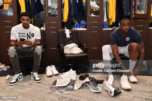 Gary Harris and Darrell Arthur of the Denver Nuggets get ready before the game against the Detroit Pistons on March 15, 2018 at the Pepsi Center in...