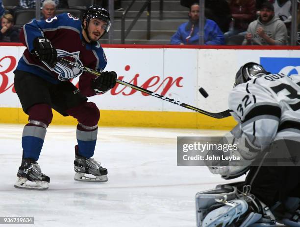 Los Angeles Kings goaltender Jonathan Quick makes a save on a shot by Colorado Avalanche left wing Matt Nieto during the first period on March 22,...