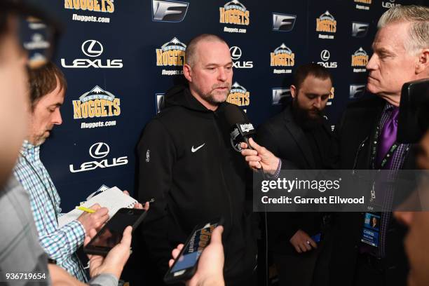 Head Coach Michael Malone of the Denver Nuggets talks with media before the game against the Detroit Pistons on March 15, 2018 at the Pepsi Center in...