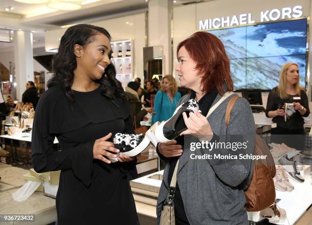 Commerce Editor at InStyle Alexis Bennett speaks with guests at the InStyle x Michael Kors Style Adventure At Macy's on March 22, 2018 in New York...