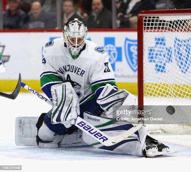 Jacob Markstrom of the Vancouver Canucks makes a kick save against the Chicago Blackhawks at the United Center on March 22, 2018 in Chicago, Illinois.