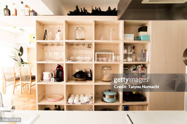 kitchen into which light comes in - armadietto da cucina foto e immagini stock