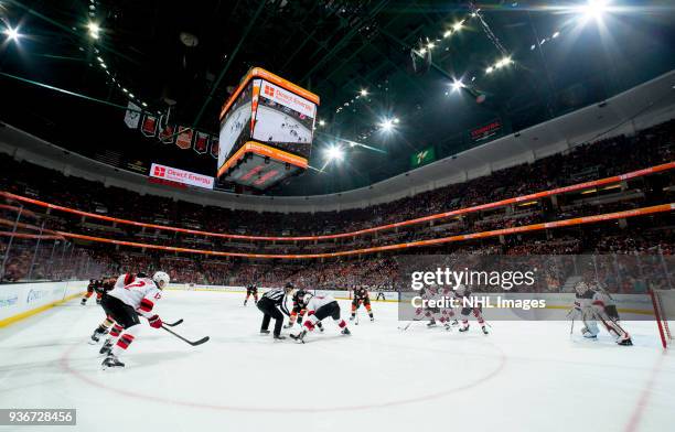 An overall view of a face-off between Derek Grant of the Anaheim Ducks and Brian Boyle of the New Jersey Devils during the first period of the game...