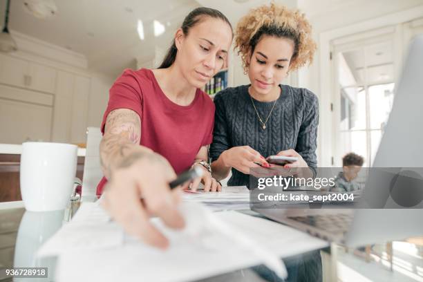 time to doing taxes - canadian money stock pictures, royalty-free photos & images