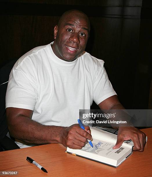 Former NBA great Earvin "Magic" Johnson attends a signing for his book "When The Game Was Ours" at Barnes & Noble Booksellers at The Grove on...