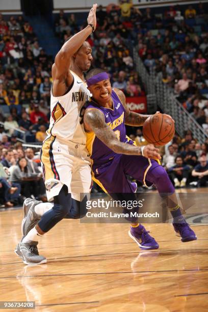 Isaiah Thomas of the Los Angeles Lakers handles the ball against Rajon Rondo of the New Orleans Pelicans on March 22, 2018 at Smoothie King Center in...