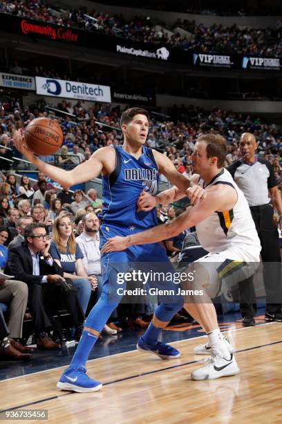 Doug McDermott of the Dallas Mavericks handles the ball during the game against the Utah Jazz on March 22, 2018 at the American Airlines Center in...