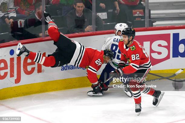 Chicago Blackhawks left wing Andreas Martinsen collides with Vancouver Canucks center Sam Gagner in the third period of play during a game between...