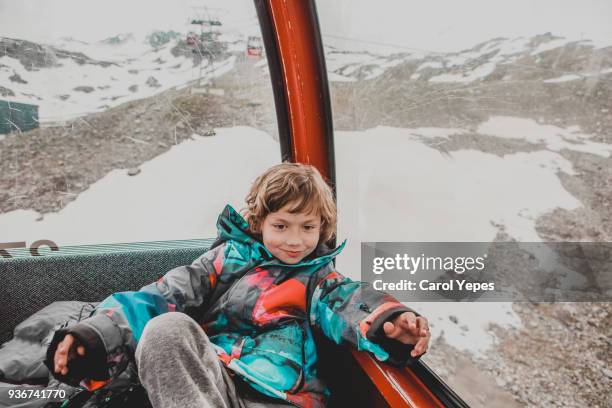 boy traveling in cablecar in tyrol, austria - fobia stock pictures, royalty-free photos & images