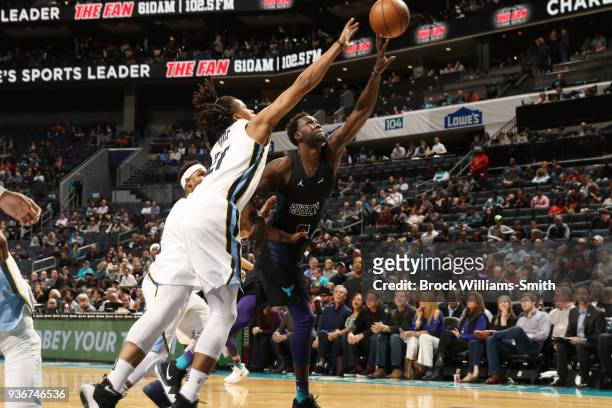 Mangok Mathiang of the Charlotte Hornets goes to the basket against the Memphis Grizzlies on March 22, 2018 at Spectrum Center in Charlotte, North...
