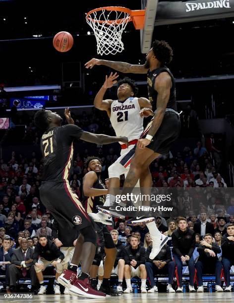 Phil Cofer of the Florida State Seminoles blocks the shot of Rui Hachimura of the Gonzaga Bulldogs in the second half in the 2018 NCAA Men's...