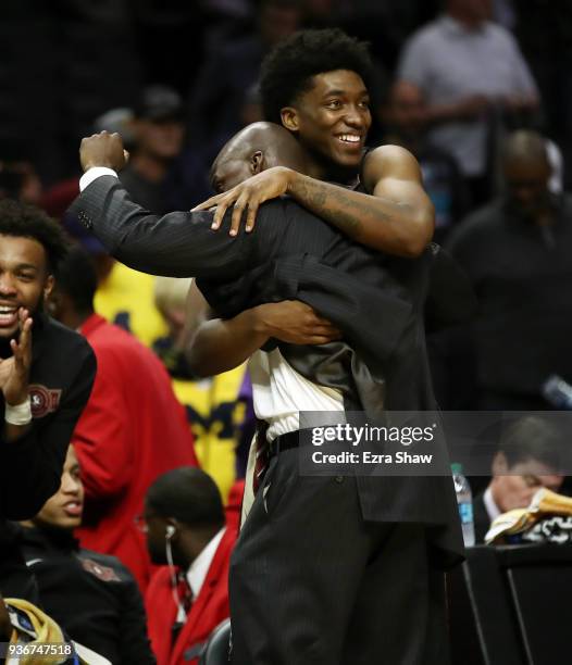 Terance Mann and head coach Leonard Hamilton of the Florida State Seminoles celebrate their teams win over the Gonzaga Bulldogs in the 2018 NCAA...