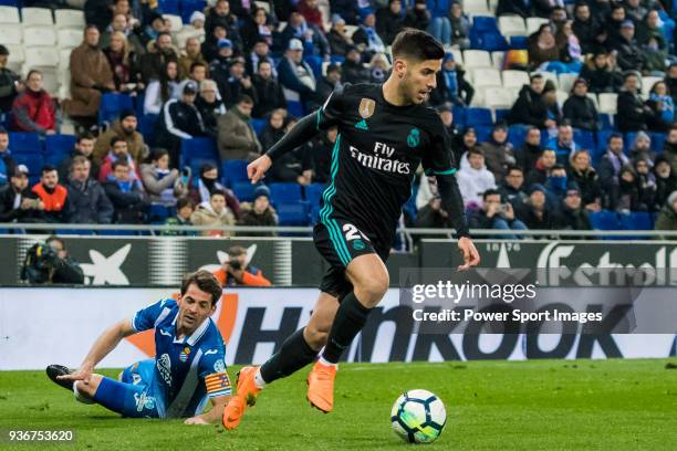 Marco Asensio Willemsen of Real Madrid competes for the ball with Víctor Sanchez Mata, Victor S, of RCD Espanyol during the La Liga 2017-18 match...