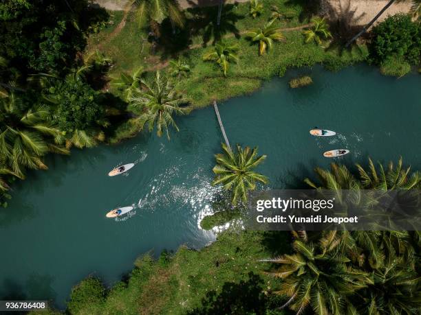 aerial view paddling at cokel river pacitan, east java - indonesia - indonesia stock pictures, royalty-free photos & images
