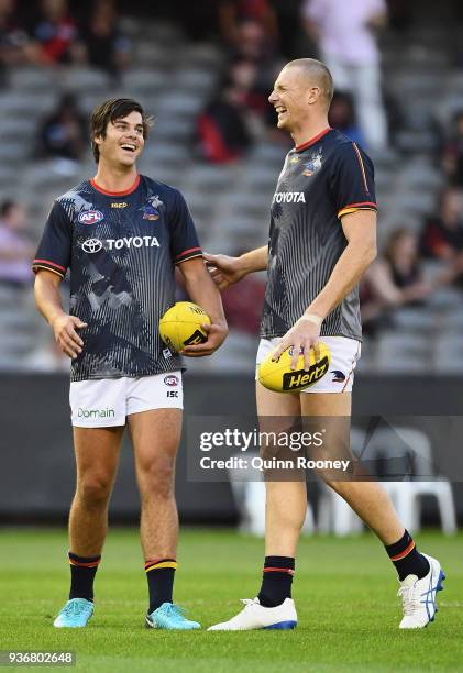 Darcy Fogarty and Sam Jacobs of the Crows have a laugh during the round one AFL match between the Essendon Bombers and the Adelaide Crows at Etihad...