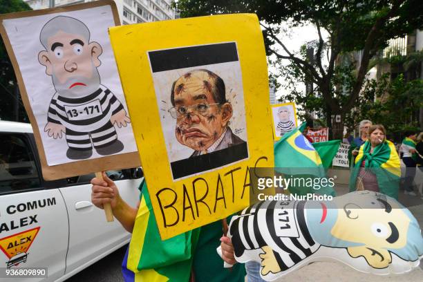 Demonstrators protest in Sao Paulo, Brazil on March 22 while the Supreme Court rules in the Brazilian capital, the Habeas Corpus that could prevent...